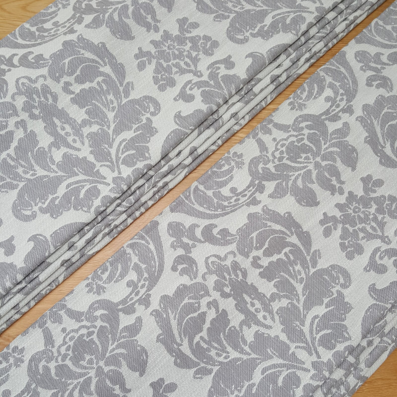 Bespoke handmade Roman Blind by Lucy J Interiors in silver grey fabric