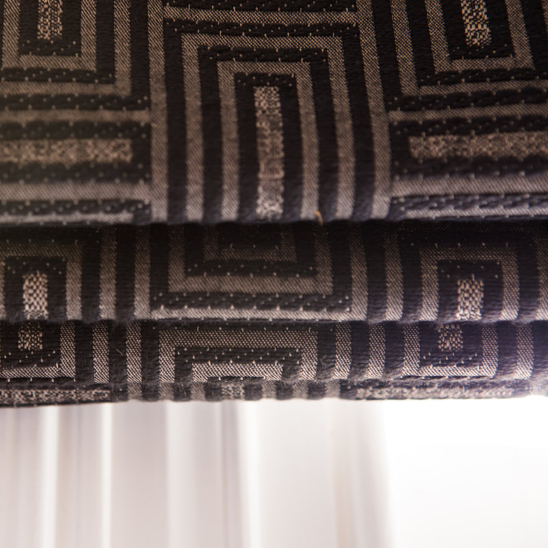 Bespoke handmade Roman Blind by Lucy J Interiors in geometric woven fabric